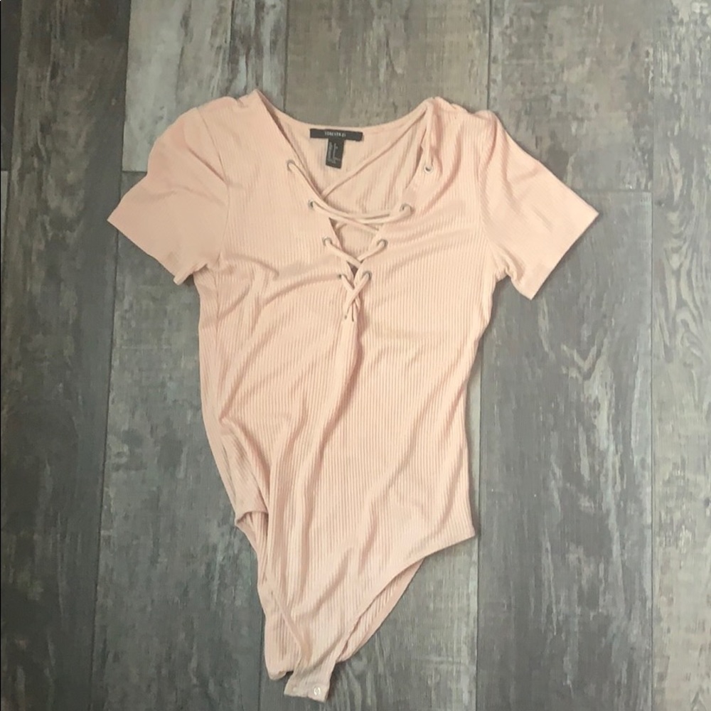 pink body suit